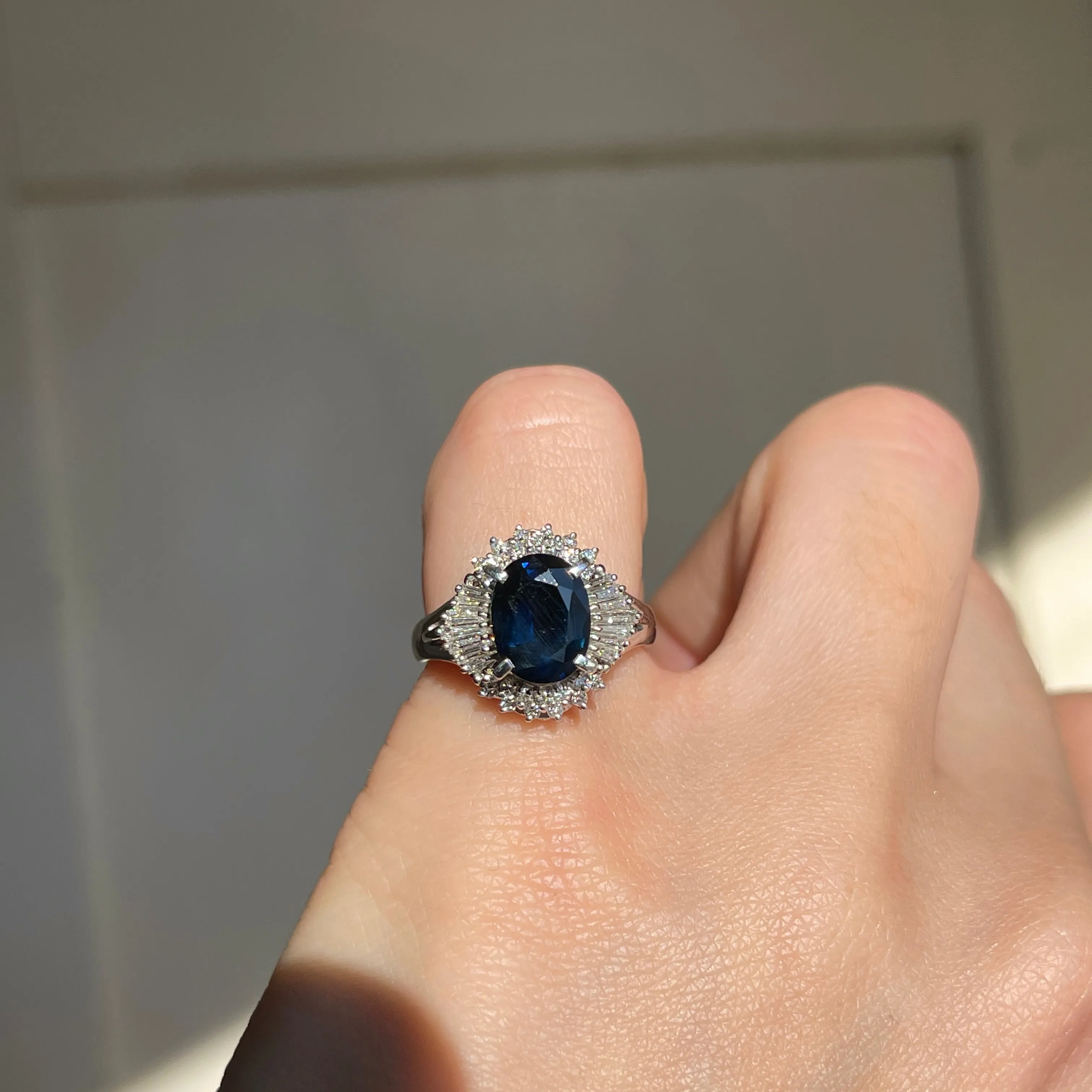 Estate Platinum Oval 2.15 CT Blue Sapphire   Baguette Diamond Halo Ring