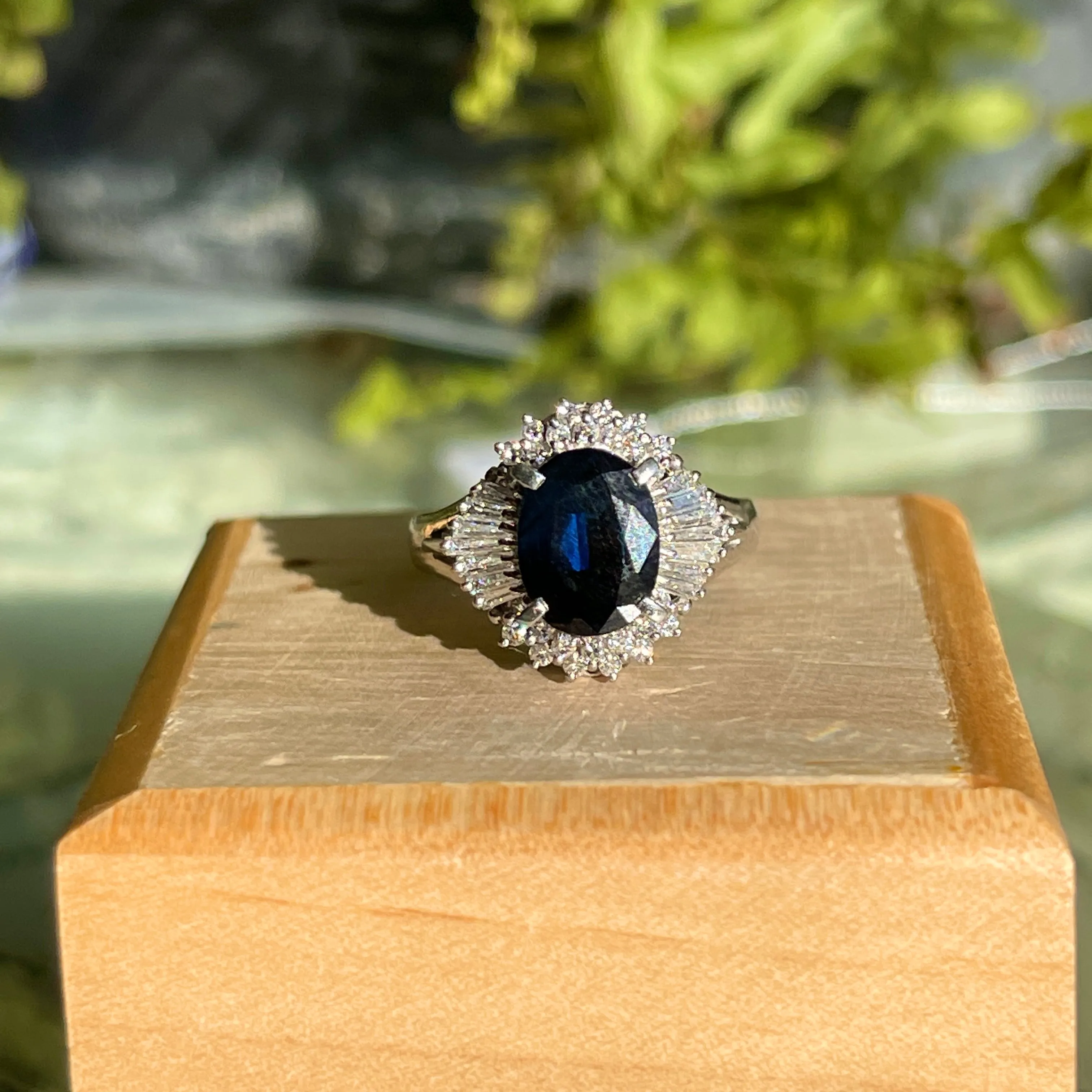 Estate Platinum Oval 2.15 CT Blue Sapphire   Baguette Diamond Halo Ring