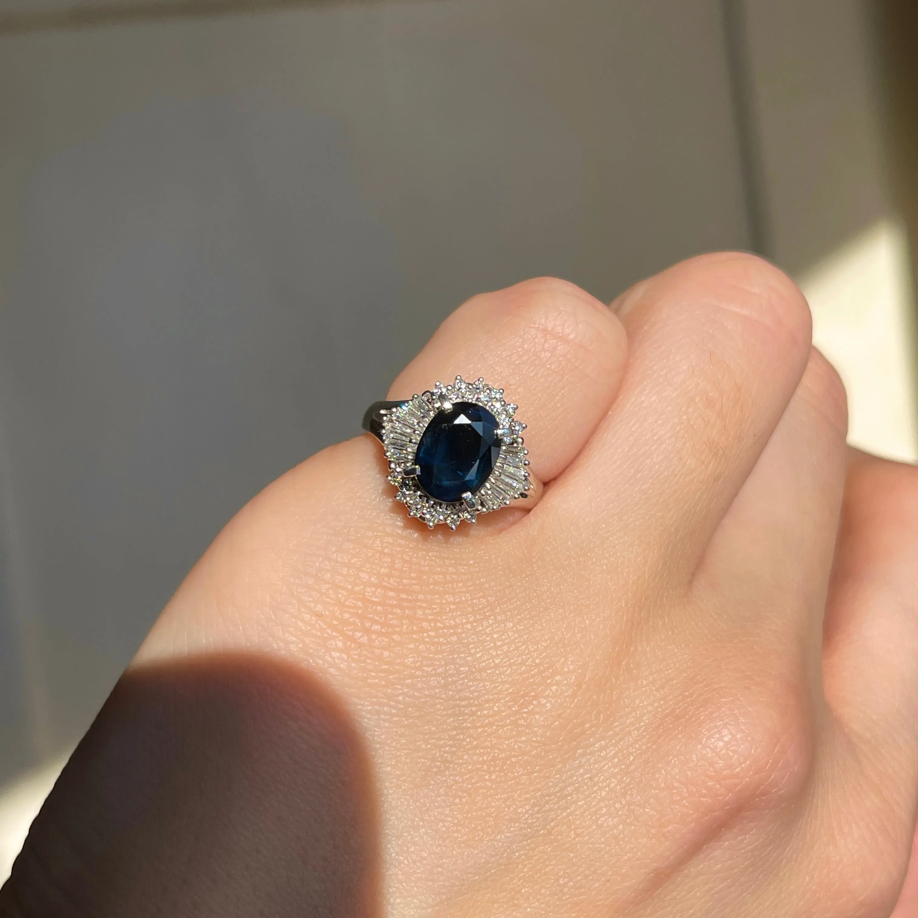 Estate Platinum Oval 2.15 CT Blue Sapphire   Baguette Diamond Halo Ring
