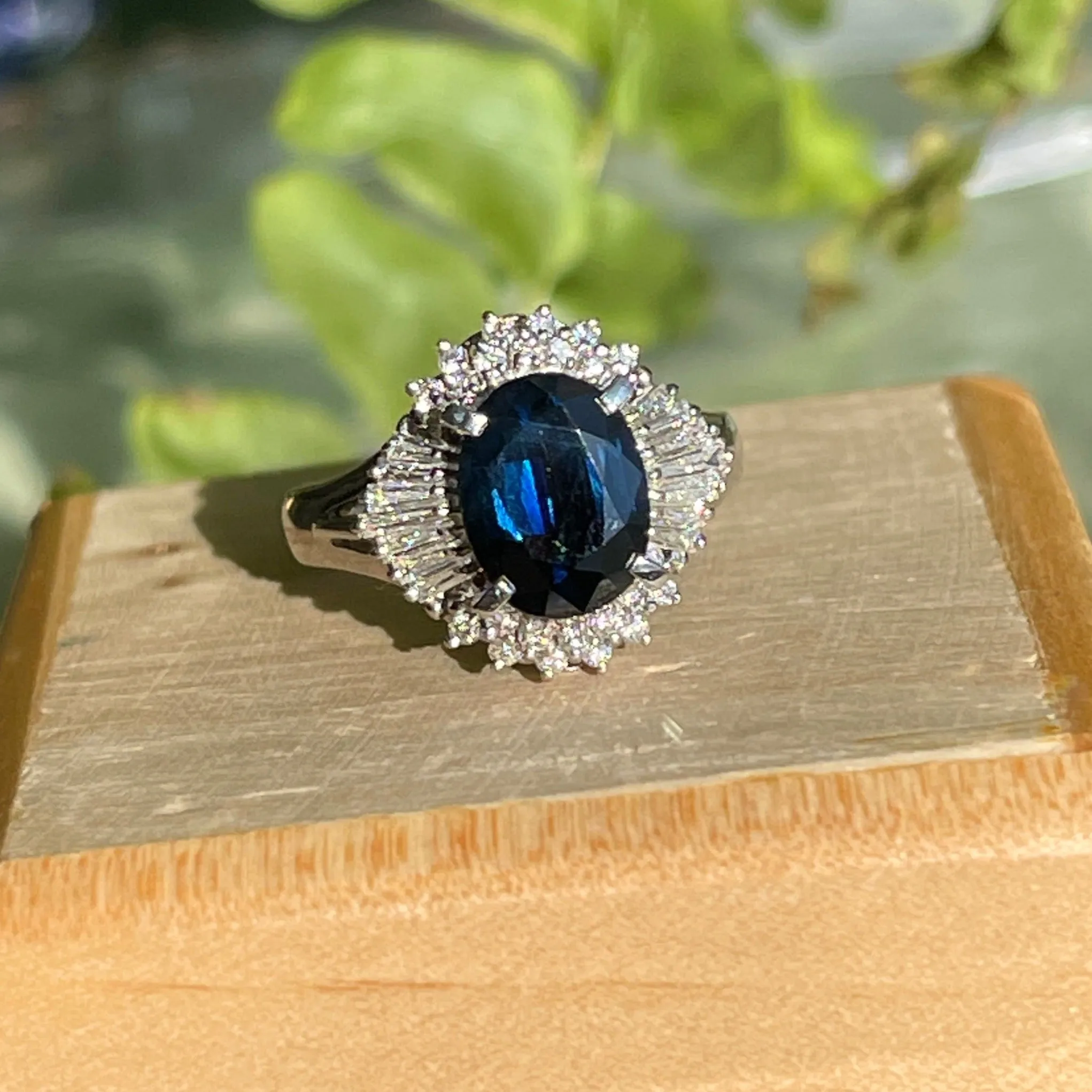 Estate Platinum Oval 2.15 CT Blue Sapphire   Baguette Diamond Halo Ring