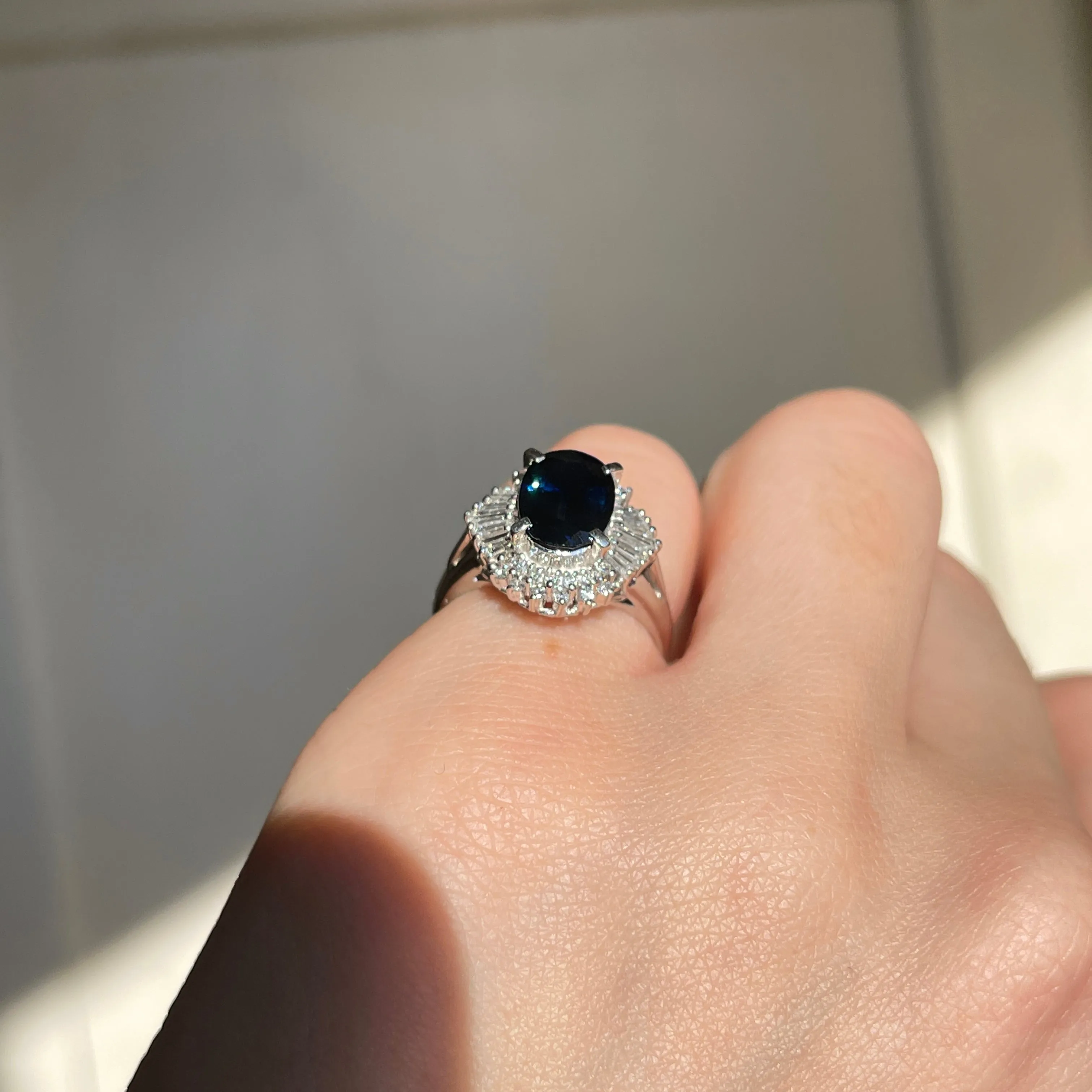 Estate Platinum Oval 2.15 CT Blue Sapphire   Baguette Diamond Halo Ring