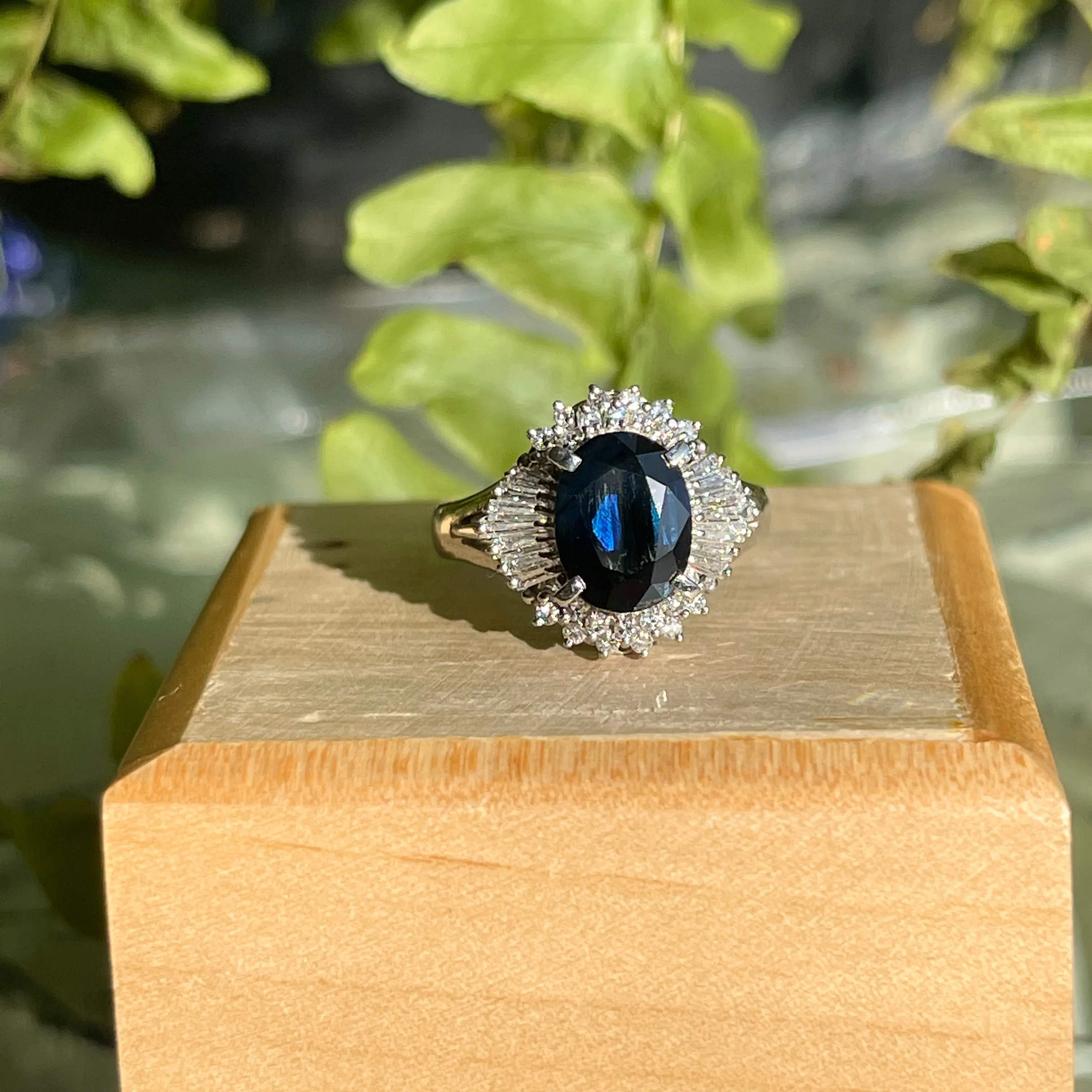 Estate Platinum Oval 2.15 CT Blue Sapphire   Baguette Diamond Halo Ring