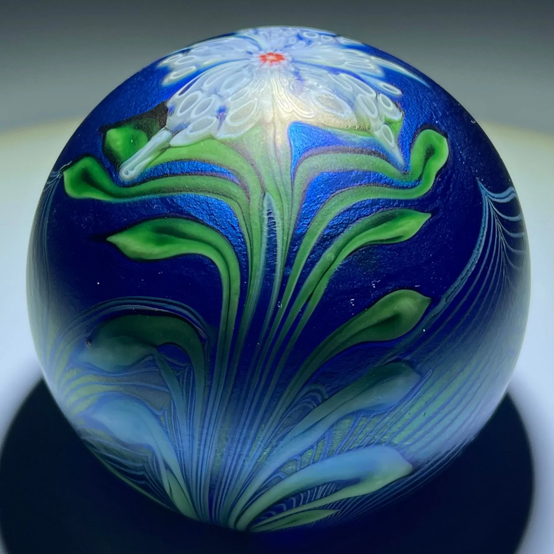 Orient & Flume 1981 Iridescent Torchwork Surface Decorated Flower on Blue Field