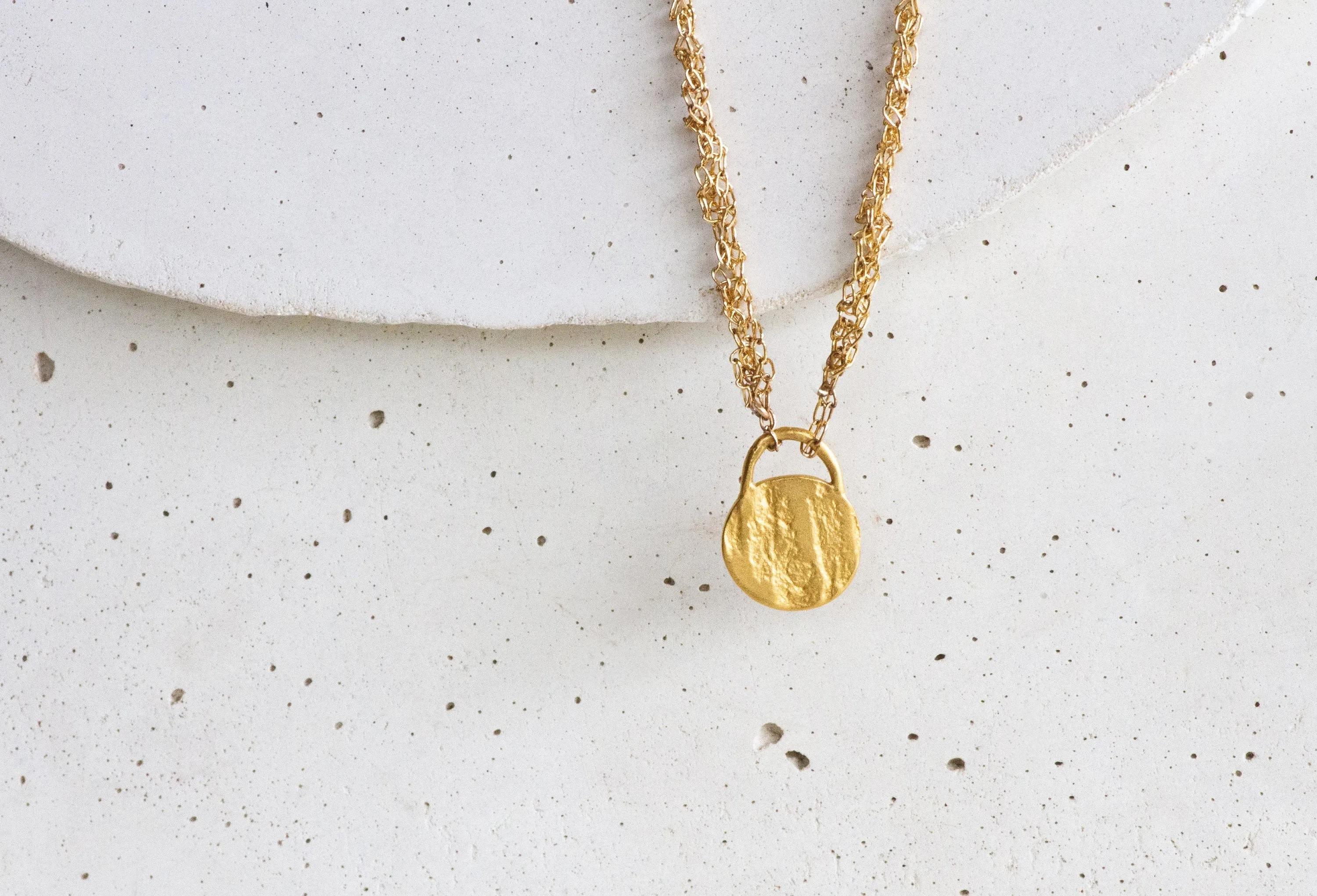 Round Organic Black And Gold Pendant