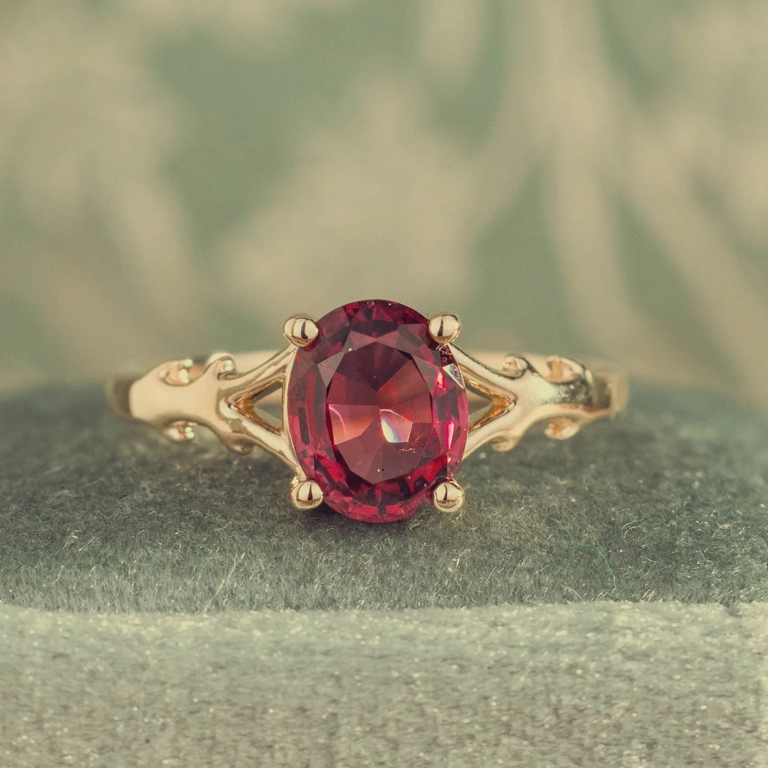 The Dakota - Oval Garnet Rhodolite Solitaire Engagement Ring with Nature-Inspired Split Shank Setting