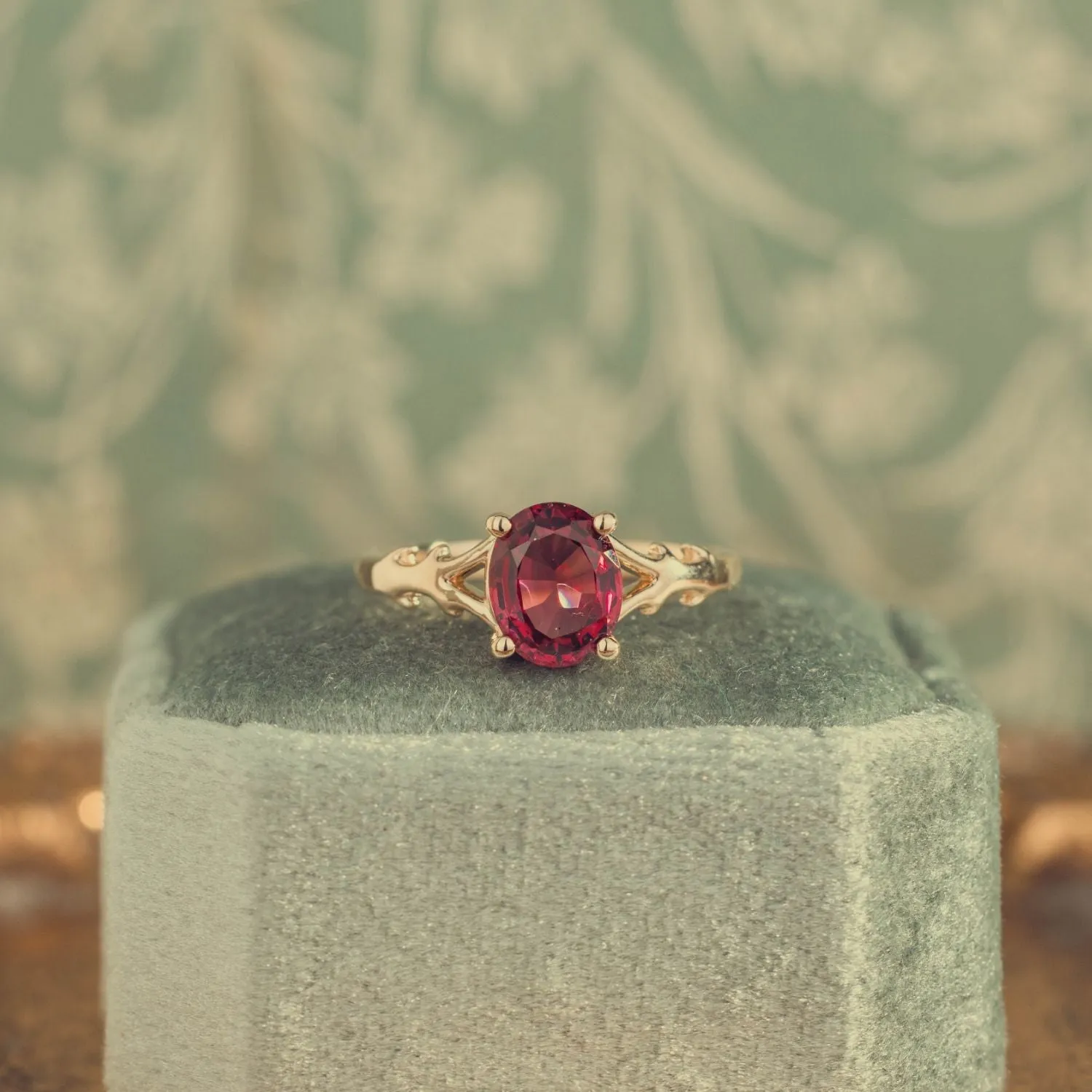 The Dakota - Oval Garnet Rhodolite Solitaire Engagement Ring with Nature-Inspired Split Shank Setting