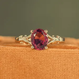 The Dakota - Oval Garnet Rhodolite Solitaire Engagement Ring with Nature-Inspired Split Shank Setting