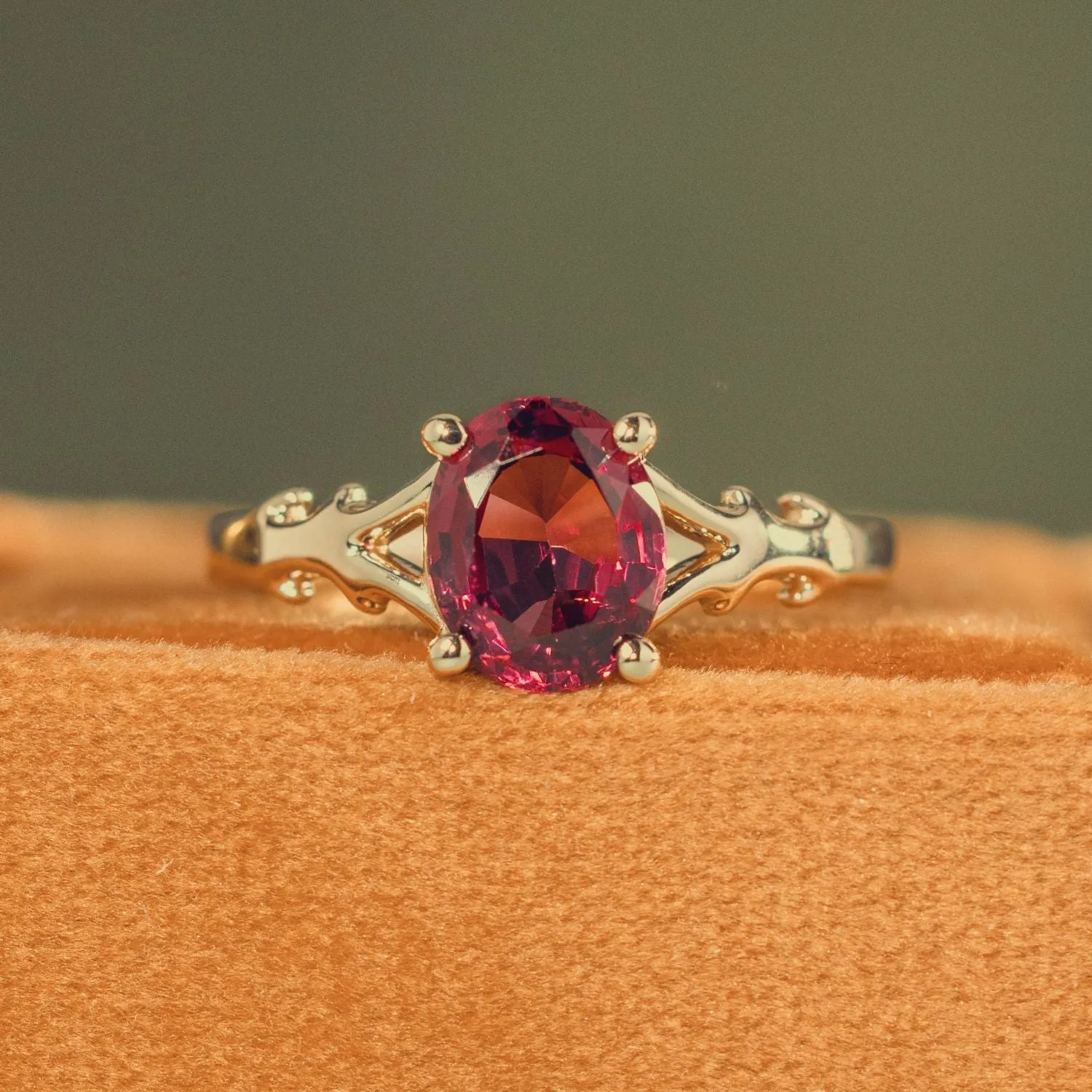 The Dakota - Oval Garnet Rhodolite Solitaire Engagement Ring with Nature-Inspired Split Shank Setting