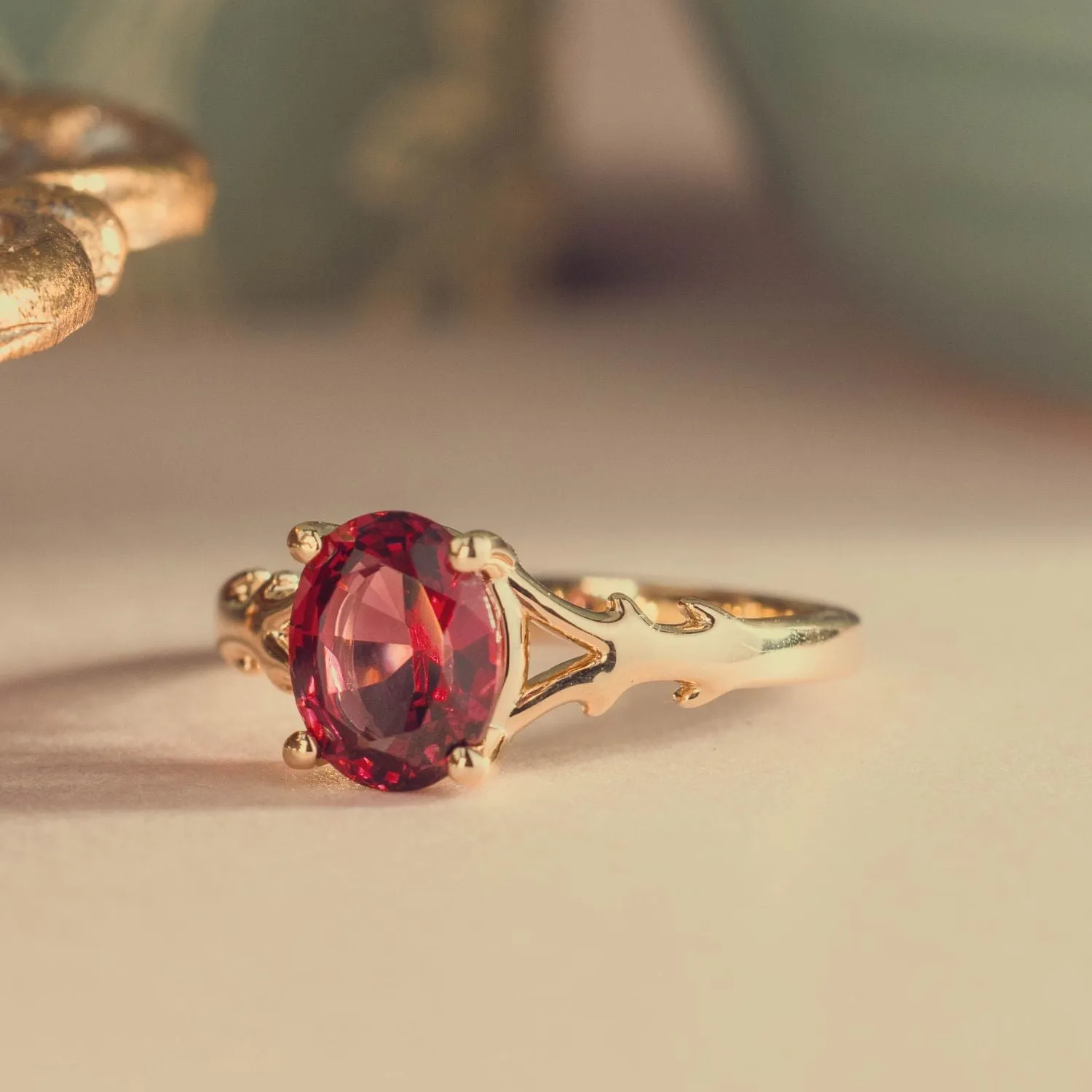 The Dakota - Oval Garnet Rhodolite Solitaire Engagement Ring with Nature-Inspired Split Shank Setting