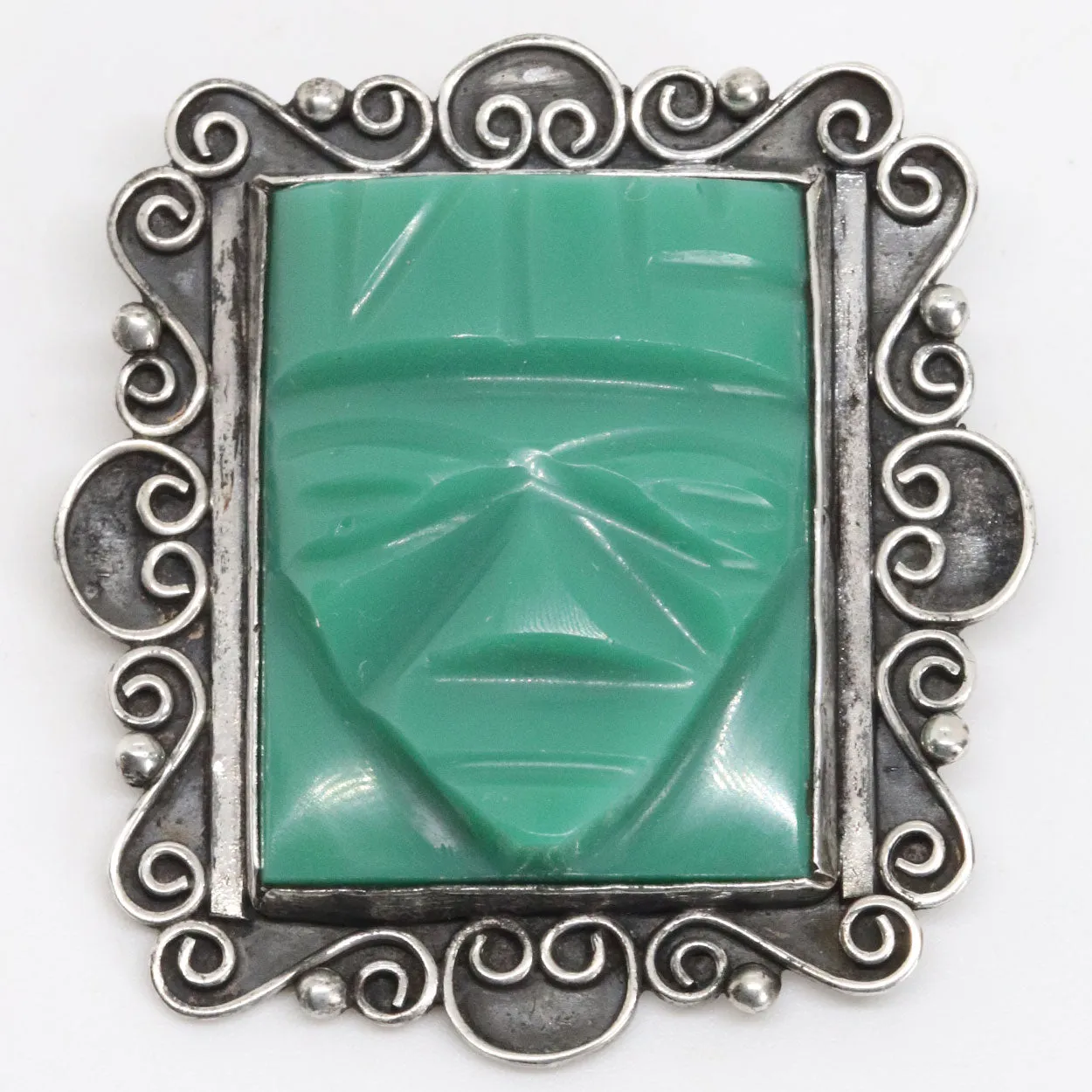 Vintage Mexican Art Deco Silver and Jade Green Glass Olmec Face Brooch