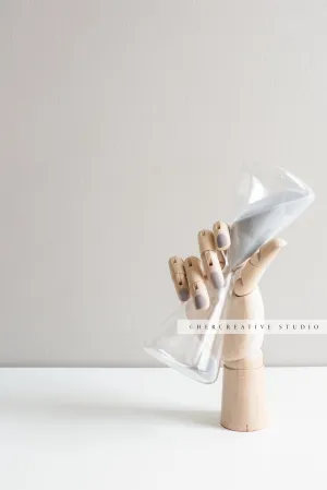 Wooden Hand Holding Hourglass. Stock Image